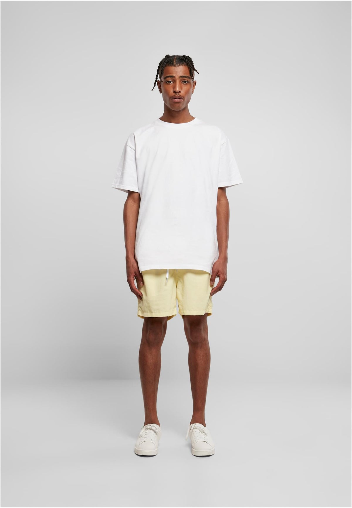 Swim Shorts in Soft Yellow, getragen