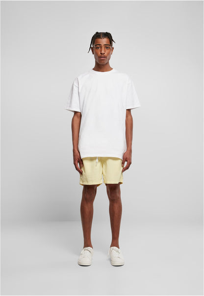 Swim Shorts in Soft Yellow, getragen