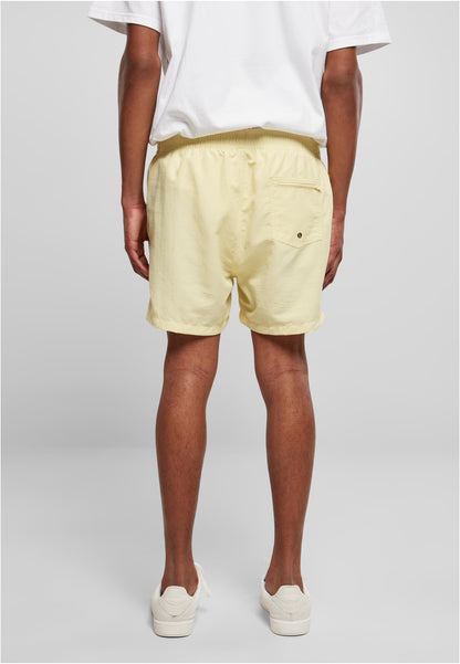 Swim Shorts in Soft Yellow, getragen