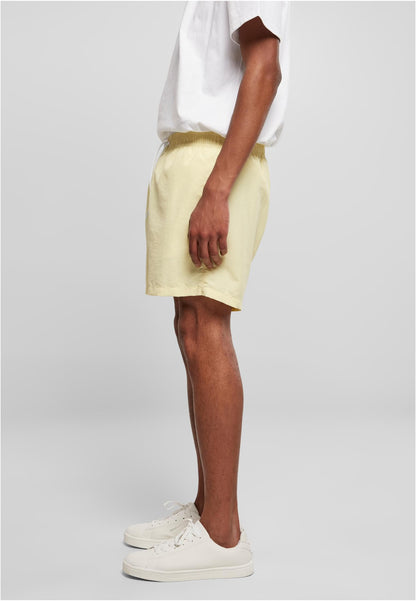 Swim Shorts in Soft Yellow, getragen
